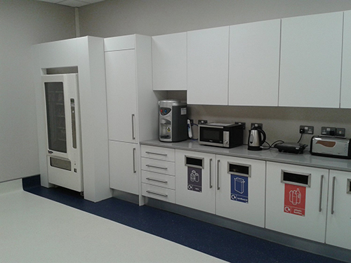 Canteen with waste chutes